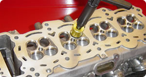 Valve seat angles recut by hand